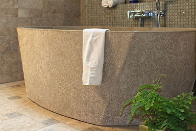 View a selection of projects where concrete was used to cast sinks, tubs, and vertical surfaces for shower surrounds